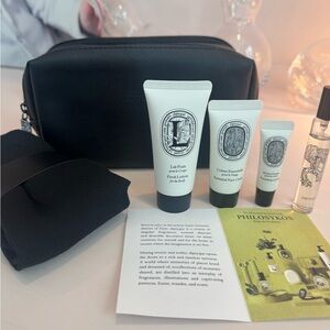 Diptyque Travel case with body lotion, face cream, philosykos eau de toilette